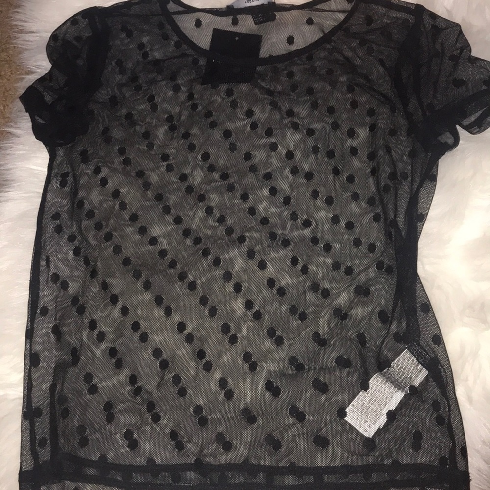 Sheer black top.